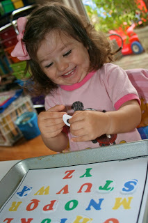Sophia loving the beginning sounds alphabet scoops! Beginning Sounds Alphabet Scoops!