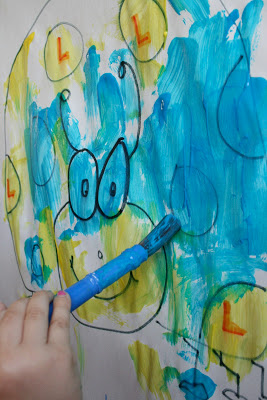 Sophia learned that yellow and blue make green! Toddler Tasks Week 6!