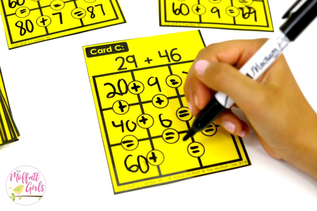 Crisscross Number Puzzles to teach place value addition. Plus, more fun math centers to teach place value in 2nd grade!
